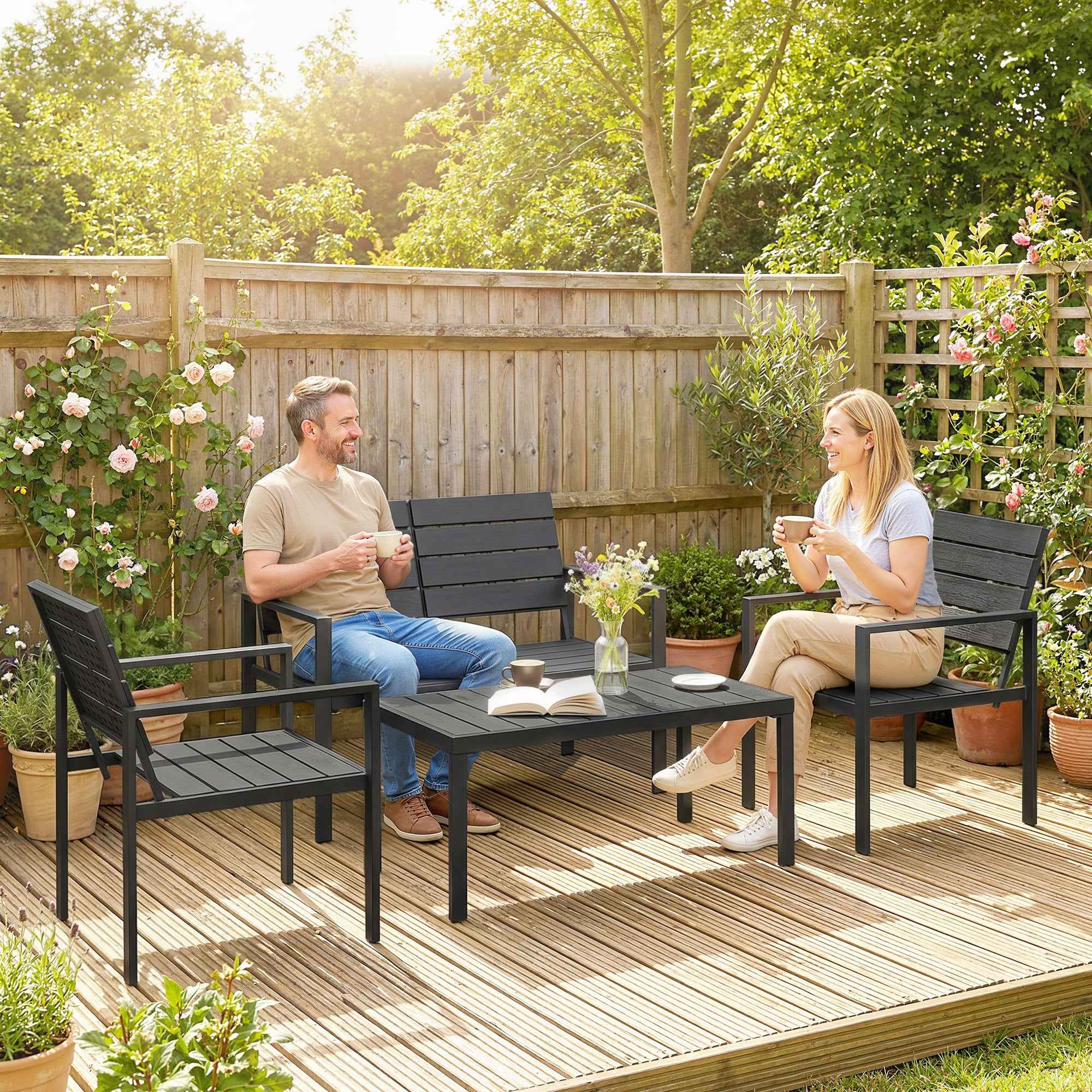 Outsunny 4-Piece Garden Lounge Set with Coffee Table, 2-Seater Sofa, and 2 Chairs, in HDPE and Black Metal