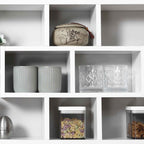 HOMCOM Wall Mounted Bookcase with 8 Compartments in 3 Different Sizes, Wall Shelf with Anti-Tip Design, White Chipboard Panels, 85x14.5x47.5cm, Capacity: 20kg