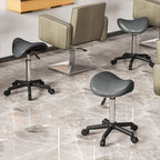 Swivel Saddle Stool with Wheels and Adjustable Height, Padded and Upholstered in Faux Leather, Grey