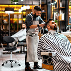 Beautician Stool with Wheels and Backrest, Adjustable Height and Swivel Seat in Faux Leather, Black